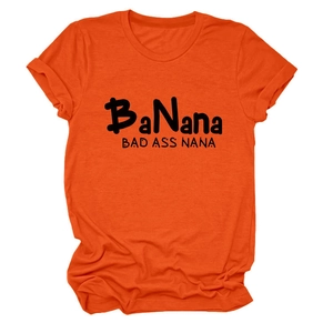 Detail of the Bad Ass Nana text printed on an orange crew neck short sleeve t-shirt