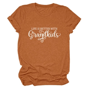 Detail of burnt orange t-shirt featuring Life is Better with Grandkids white lettering