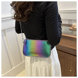 Close-up of holographic crossbody bag with silver bead trim and metal chain strap