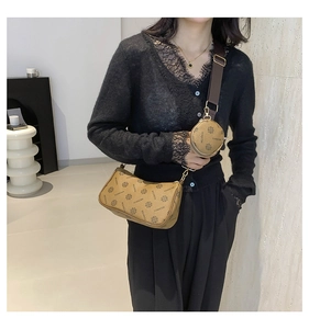 Brown vintage hobo bag with mini round pouch and adjustable wide textile strap