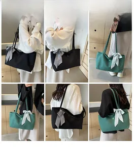 Modische Damen-Canvas-Tragetasche mit Schultergurt und Ansichten zum Modell-Tragekomfort