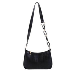 Minimalist black crocodile embossed crossbody bag with golden chain and zip detail