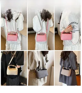 Detailed grid view of multi-color striped crossbody bags showing adjustable shoulder straps