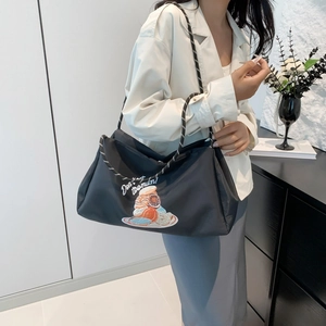 Grand sac fourre-tout noir avec broderie donut et bandoulière en corde tressée