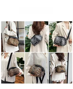 Detailed views of leopard print canvas crossbody bag in brown and grey animal patterns