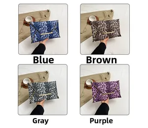 Leopard print envelope clutch bags in blue, brown, grey, and purple with gold metal bars