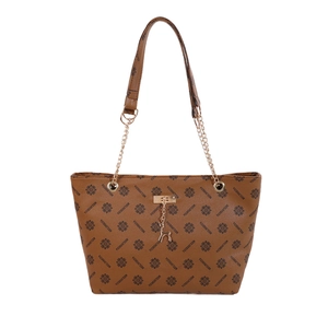 Brown vintage monogram tote bag with chain strap and gold deer pendant on white background