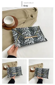 Chic grey leopard print envelope clutch with golden metal trim and sleek modern design