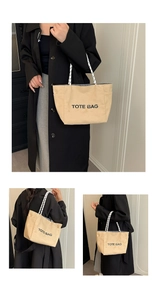 Detail view of khaki canvas tote bag with woven straps and TOTE BAG print