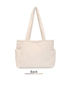 Back view of a beige corduroy tote bag featuring side pockets and wide straps