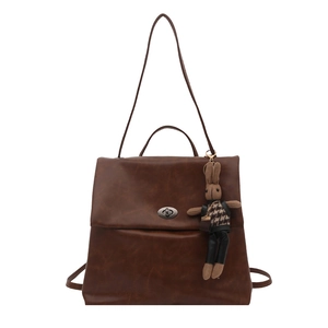 Vintage dark brown PU leather backpack for women with bunny charm and metal twist lock