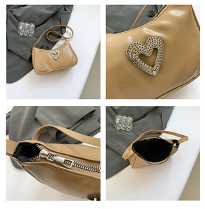 Detailed views of apricot faux leather baguette bag with rhinestone heart buckle