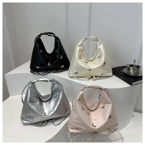 Hobo tote bag with butterfly rivets and chain straps in four assorted colors