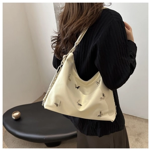 Creamy PU leather hobo bag with silver butterfly studs and chain strap for women