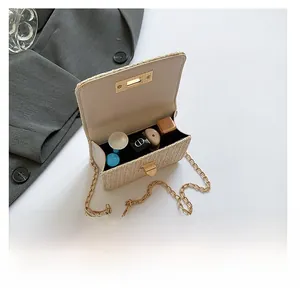 Interior view showing the storage capacity of the woven straw bag with personal items