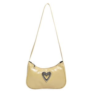 Chic pale yellow shoulder bag with a large silver heart buckle and glossy finish