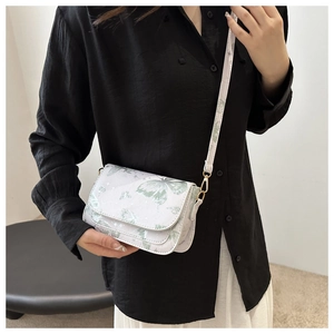 White butterfly pattern flap shoulder bag with star details and gold hardware for women