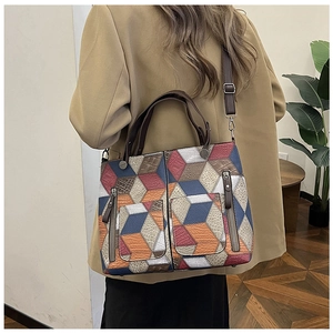 Medium tote bag with colorful 3D geometric cube patterns and symmetrical front flap pockets
