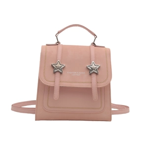 Pink mini leather backpack and handbag with silver star details and white lettering
