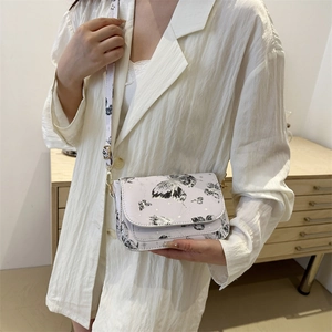 White mini chain shoulder bag with butterfly print and vintage flap cover style