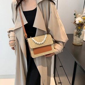 2024 stylish straw handbag for women with pearl handle and brown leather strap detail
