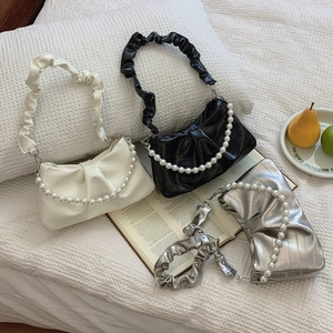 Chic ruched underarm bags in cream, black, and silver with elegant pearl chain handles