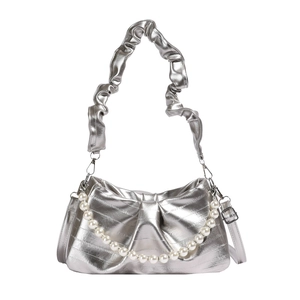 Silver metallic pleated underarm bag with bow detail and elegant pearl chain handle
