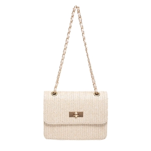 Sac bandoulière chic en paille tissée beige avec fermoir doré et bandoulière