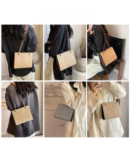 Chic straw woven and houndstooth shoulder bags with gold chain straps shown on models
