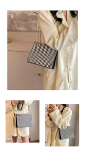 Detailed views of a black and white houndstooth handbag with gold chain strap for women