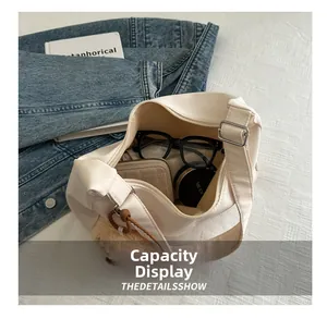 Internal view of beige tote bag showing spacious capacity for wallet and cosmetics