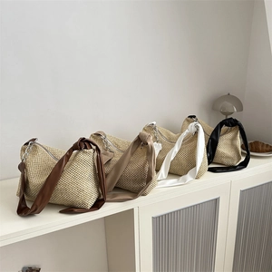 Large woven tote bags with knotted leather straps in four colors for summer 2025