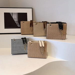 Chic woven tote bags with gold chain straps in houndstooth and chevron patterns