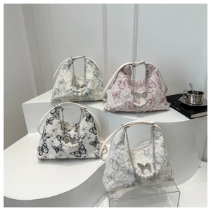 Butterfly patterned tote bags in four colors with pearl chains and shoulder straps