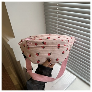 Pink corduroy saddle bag with strawberry print and adjustable strap for women