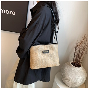 Retro woven straw square shoulder bag with black leather label and knotted strap
