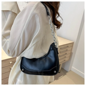 Minimalist black crescent hobo bag for women with silver chain strap and matte leather texture