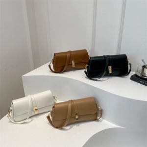 Sac Sous les Aisselles Minimaliste en Cuir PU pour Femme Mode Couleur Unie Sac à Épaule Fermoir Métal Sac Baguette Quotidien