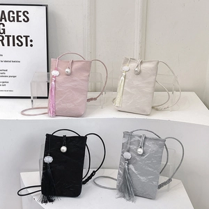 Minimalist phone crossbody bag with tassel and pearl buckle in pink white black and gray
