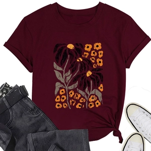 Burgundy T-shirt detail with floral sunflower print, cuffed sleeves, and side-knot hem