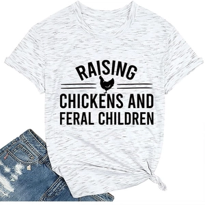 Detail of Raising Chickens graphic T-shirt with denim shorts on white background