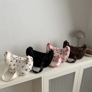 Corduroy dumpling bag with strawberry prints available in white black pink and brown