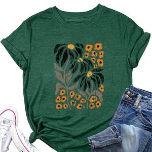 Detail of elegant dark green T-shirt featuring a floral abstract print and soft fabric texture