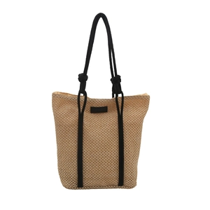 Minimalist straw tote bag with black rope handles for summer beach vacation and daily use