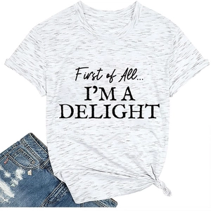 Detail of grey crewneck t-shirt featuring First of All... I'M A DELIGHT slogan and side knot