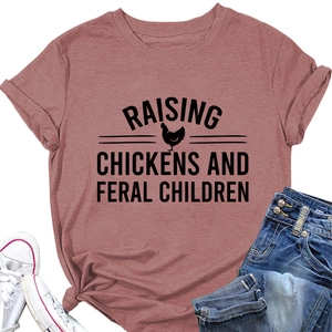 Flat lay of pink cotton T-shirt with chicken print paired with blue denim jeans