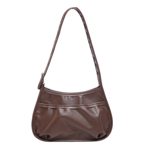 Minimalist dark brown crescent shoulder bag with vintage pleated details and silver buckle