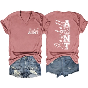 Detail view of pink V-neck baseball aunt T-shirt and ripped denim shorts with white prints