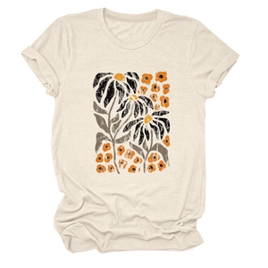 Close-up of vintage floral print and fabric texture on cream-colored round neck T-shirt
