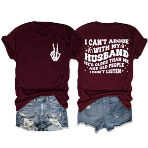 Detail view of burgundy t-shirt with skull hand graphic and back typography slogan